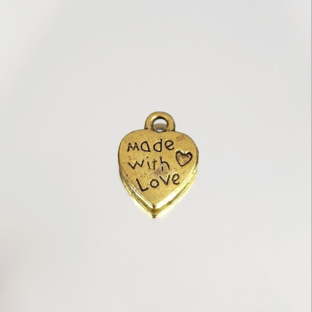 3/$18 Pendant/Charm mini heart in copper tone 1 pc